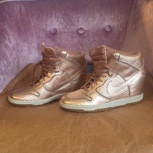 Awesome rose gold snakeskin Nike wedge sneakers!!